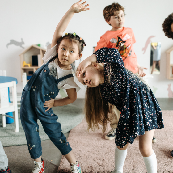 Two children dancing